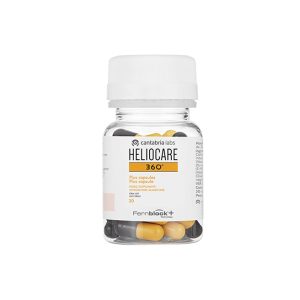 Heliocare - Plus capsules. A glass bottle with a white screw top and Heliocare branding.