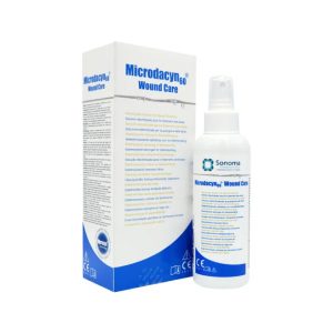 Microdacyn - wound care. A white bottle with blue branding and a spray cap.