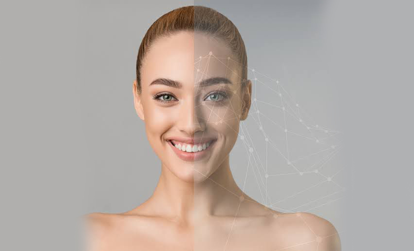 A woman's face in profile who is smiling. There are scientific looking lines covering the right side of her face.